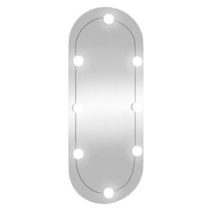 Vidaxl Stensko ogledalo z LED lučkami 30x70 cm stekleno ovalno