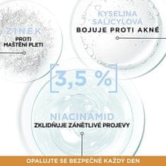 Garnier Zaščitni fluid proti nepravilnostim z niacinamidom SPF 50+ Ambre Solaire (Super UV Niacinamide) 40 m