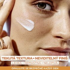 Garnier Zaščitni fluid proti temnim madežem z vitaminom C SPF 50+ Ambre Solaire (Super UV Fluid) 40 ml