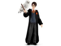 Schleich SLH42633 Schleich Harry Potter - Harry Potter in Hedwig, otroška figurica 6+ 