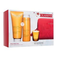 Clarins Aroma Self-Care Essentials Set balzam za telo Tonic Hydrating Oil-Balm 200 ml + gel za prhanje Tonic Bath & Shower Concentrate 200 ml + dišeča svečka 35 g + kozmetična torbica za ženske