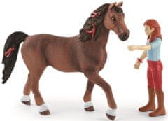 Schleich 42539 lutka rdečelaska Hannah z gibljivimi sklepi, jahanje