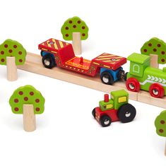 Bigjigs Rail Bigjigs železniški vagon s traktorjem + 2 tira