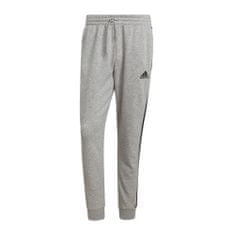 Adidas Hlače obutev za trening siva 164 - 169 cm/S Essentials Fleece Tapered Cuff 3STRIPES